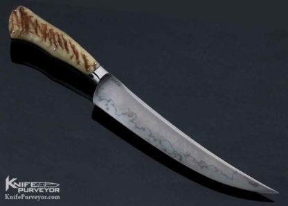 Knife Maker: Burt Foster, it is made of M.S. Integral and is named: Sheep Horn Fighter