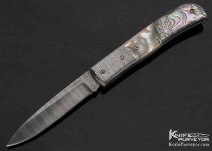 Knife Maker: Kit Carson, The knife is a Custom Knife, Made of: Damascus and Aabalone, Style: Lockback