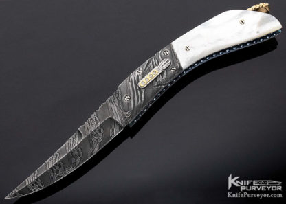 Knife Maker: George Dailey, it is a Custom Knife with Diamond Encrusted Robert Eggerling Mosaic Damascus Steel and Mother of Pearl Shell scales, Style: Auto Linerlock