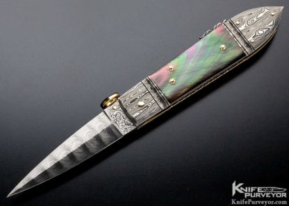 Jim Schmidt Custom Knife 14kt. Gold Lined Damascus and Black Lip Pearl Lockback
