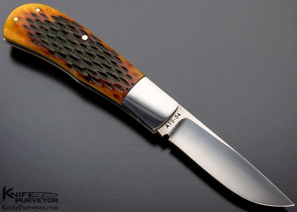 https://www.knifepurveyor.com/wp-content/uploads/2021/05/ray-cover-jigged-bone-sliptjoint-custom-knife-9594-reverse.jpg