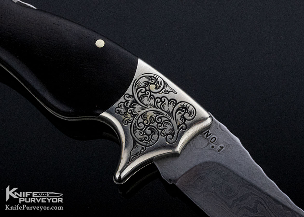 https://www.knifepurveyor.com/wp-content/uploads/2021/07/Jim-Servin-Custom-Knife-Lady-Leg-Damascus-Engraved-and-file-worked-folder-by-Fred-Harrington-11097-Reverse-Close.jpg