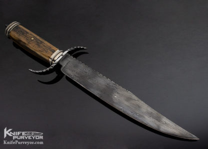 Knife Maker: Kenneth King, it is a Custom Knife style: S-Guard Bowie, it is of Sole Authorship, with Damascus Mammoth Black Jade skull crushers features