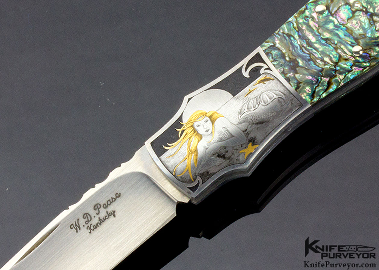 Knife Maker: W. D. Pease, Engraved by: Lisa Tomlin, it features: Green Abalone and is named the "Mermaid" and is a Lockback knife