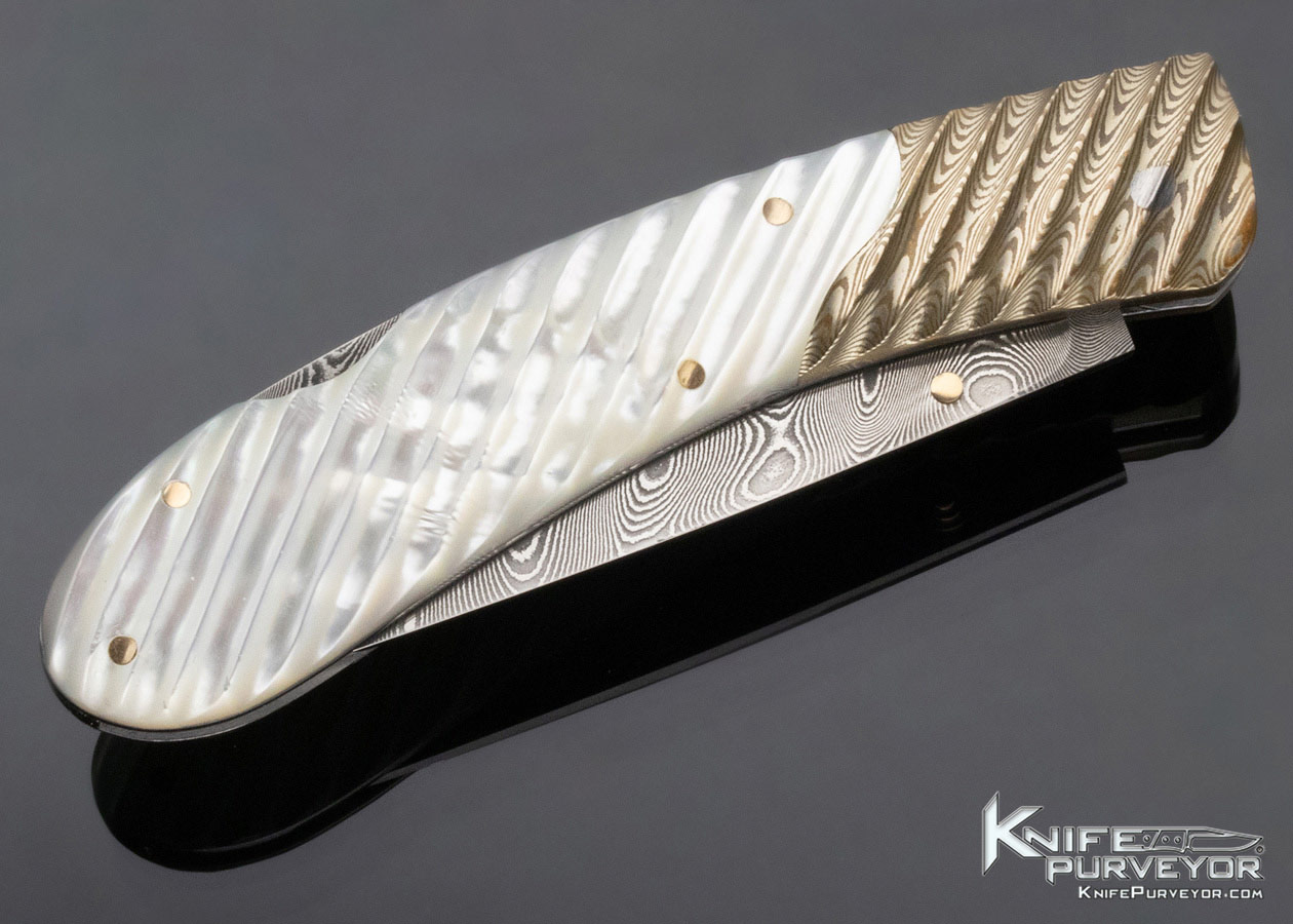 Joe Kious Custom Knife Damascus Mokume and Fluted Mother of Pearl Lockback - Image 5