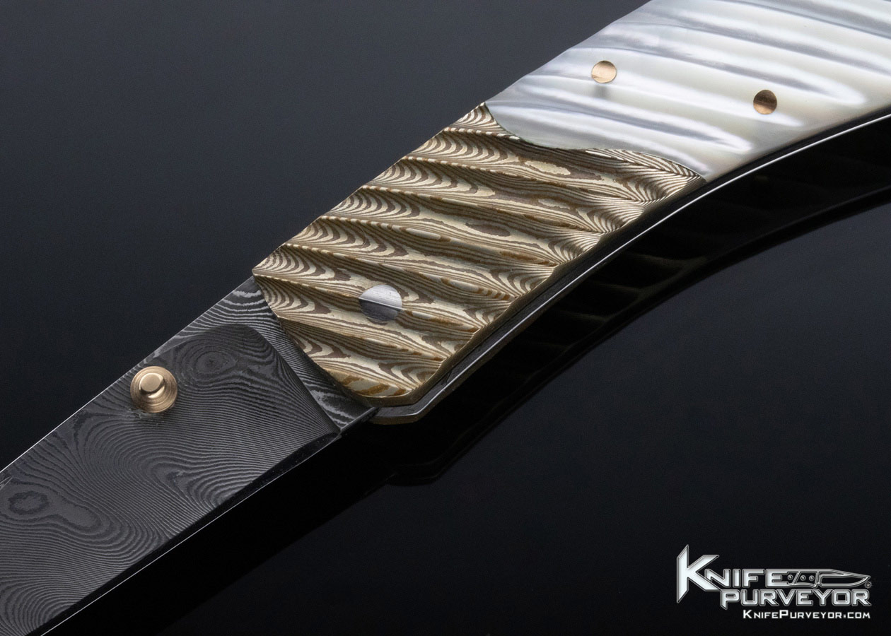 Joe Kious Custom Knife Damascus Mokume and Fluted Mother of Pearl Lockback - Image 2