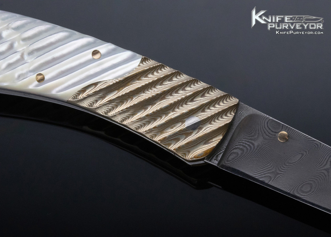 Joe Kious Custom Knife Damascus Mokume and Fluted Mother of Pearl Lockback - Image 4
