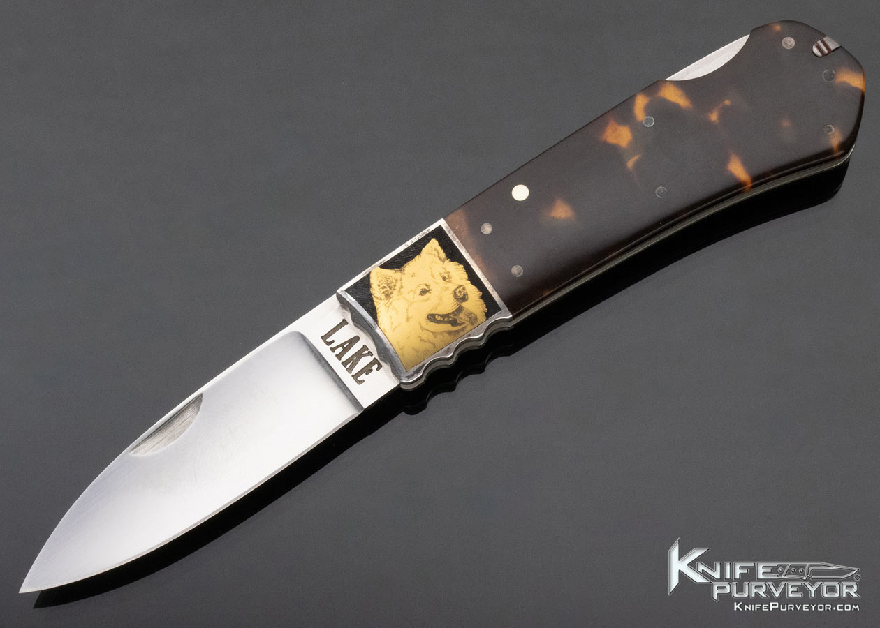 Ron-Lake-Custom-Knife-Engraved-by-Steve-Lindsay-Amber-Lockback-with-Silver-Toothpick-12854-open 12854