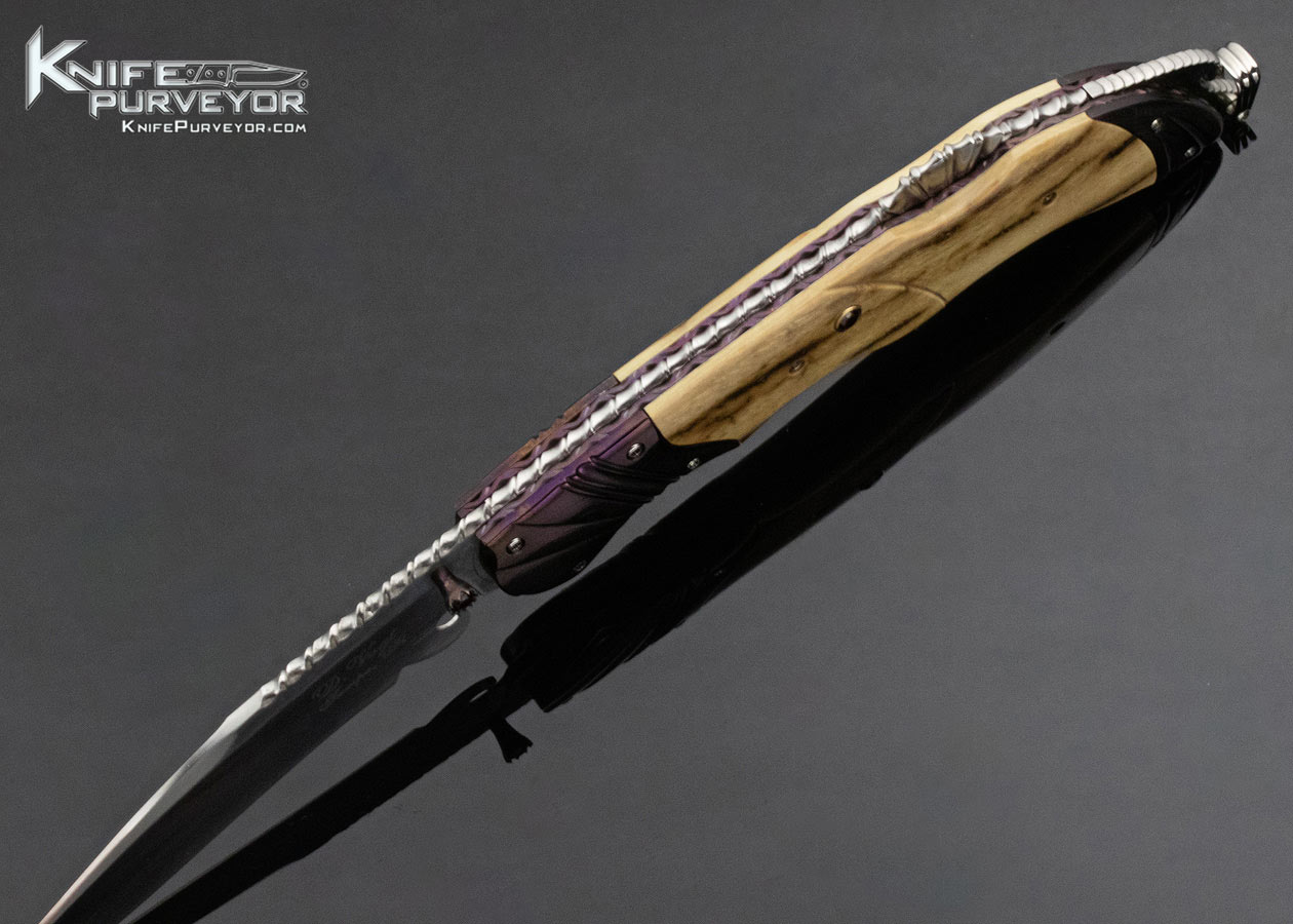 Donald Vogt Custom Knife Blued Damascus and Carved Mammoth Lockback - Image 5