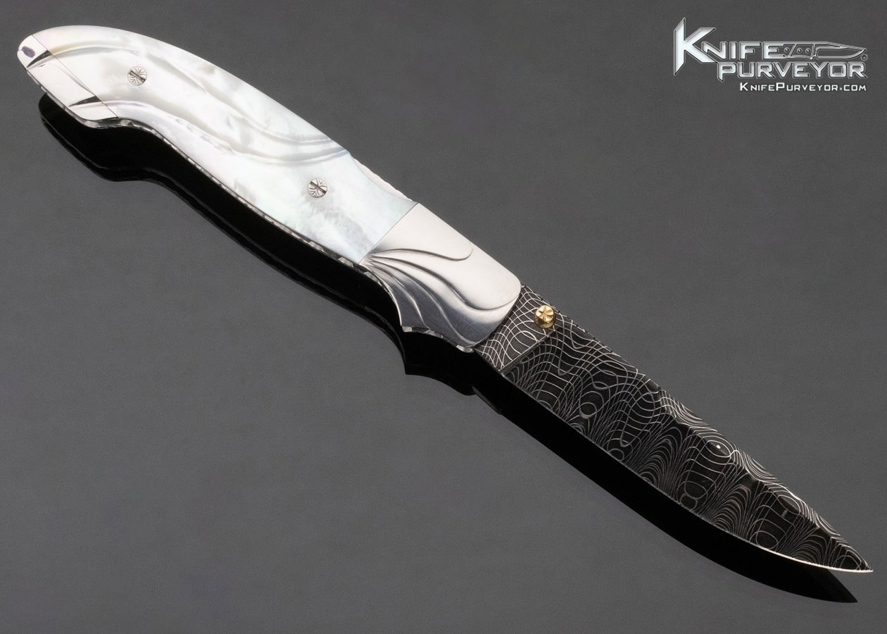 Larry Newton Custom Knife Carved Mother of Pearl Front Lock with Damascus Blade Engraved by Bailey Bradshaw - Image 3