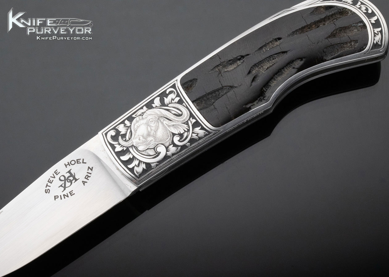 Steve Hoel Custom Knife Black Buffalo Horn Interframe Lockback Engraved by Jon Robyn - Image 2