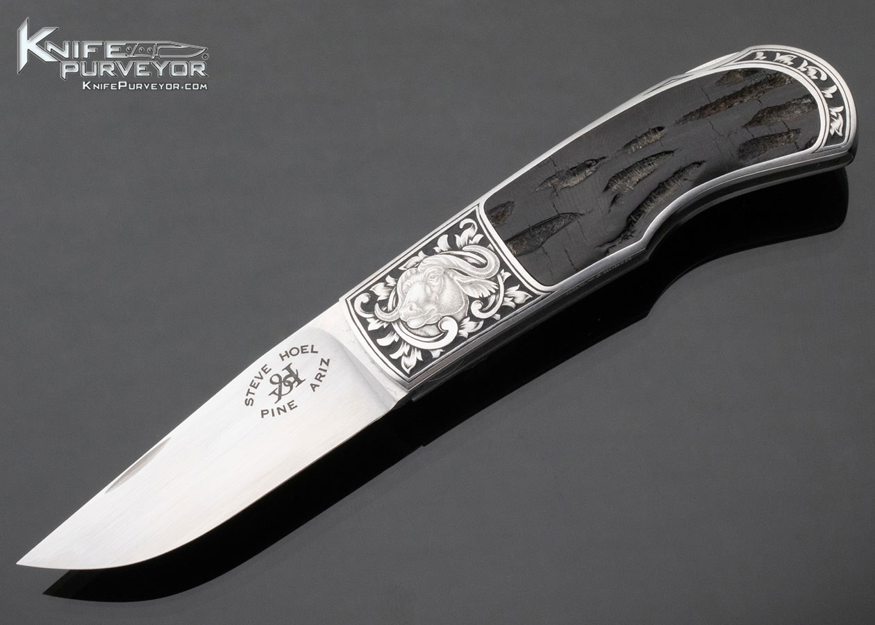 Steve Hoel Custom Knife Black Buffalo Horn Interframe Lockback Engraved by Jon Robyn 15173