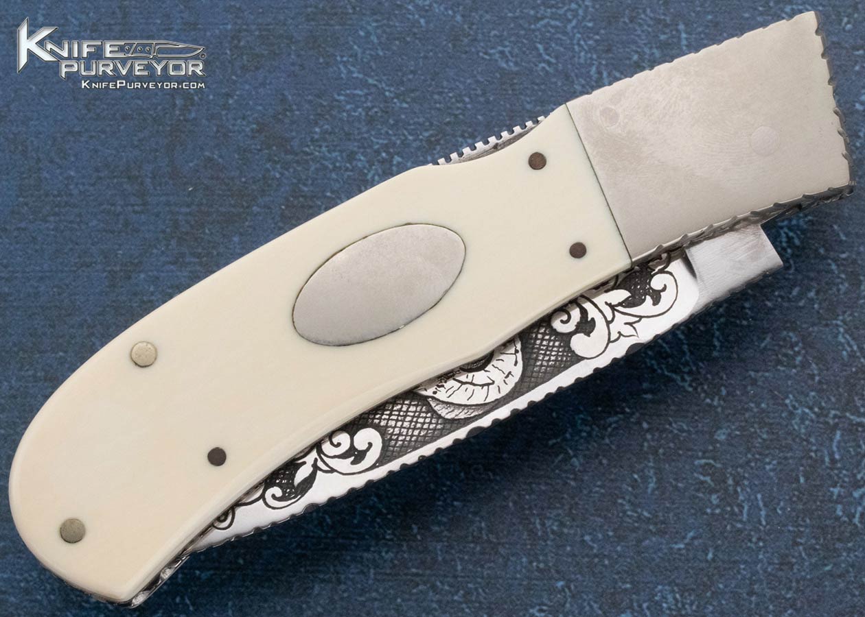 Harvey McBurnette Custom Knife Sole Authorship "Buffalo" Engraved and Scrimshawed Front Lock Circa 1976 - Image 3