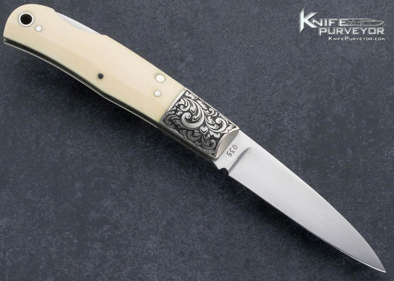 Jess Horn Custom Knife Mammoth Lockback with Escutcheon Engraved by Michael Collins - Image 4