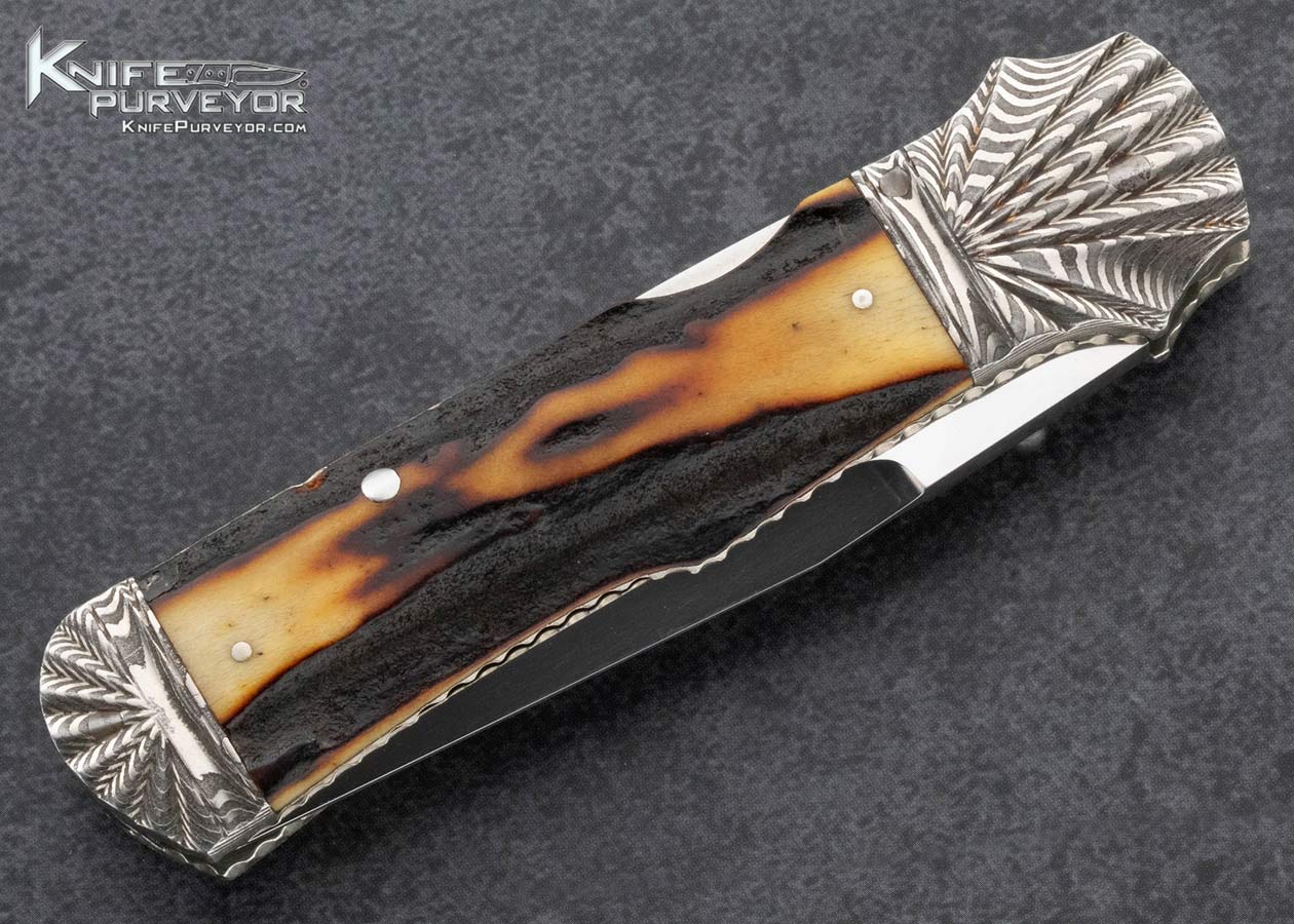 Ken Steigerwalt Custom Knife Scalloped Damascus and Amber Stag Front Lock - Image 4