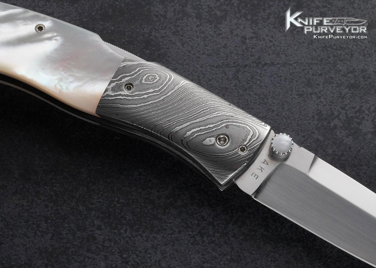Charlie-Dake-Custom-Knife-Pearl-and-Damascus-Mid-Lock-