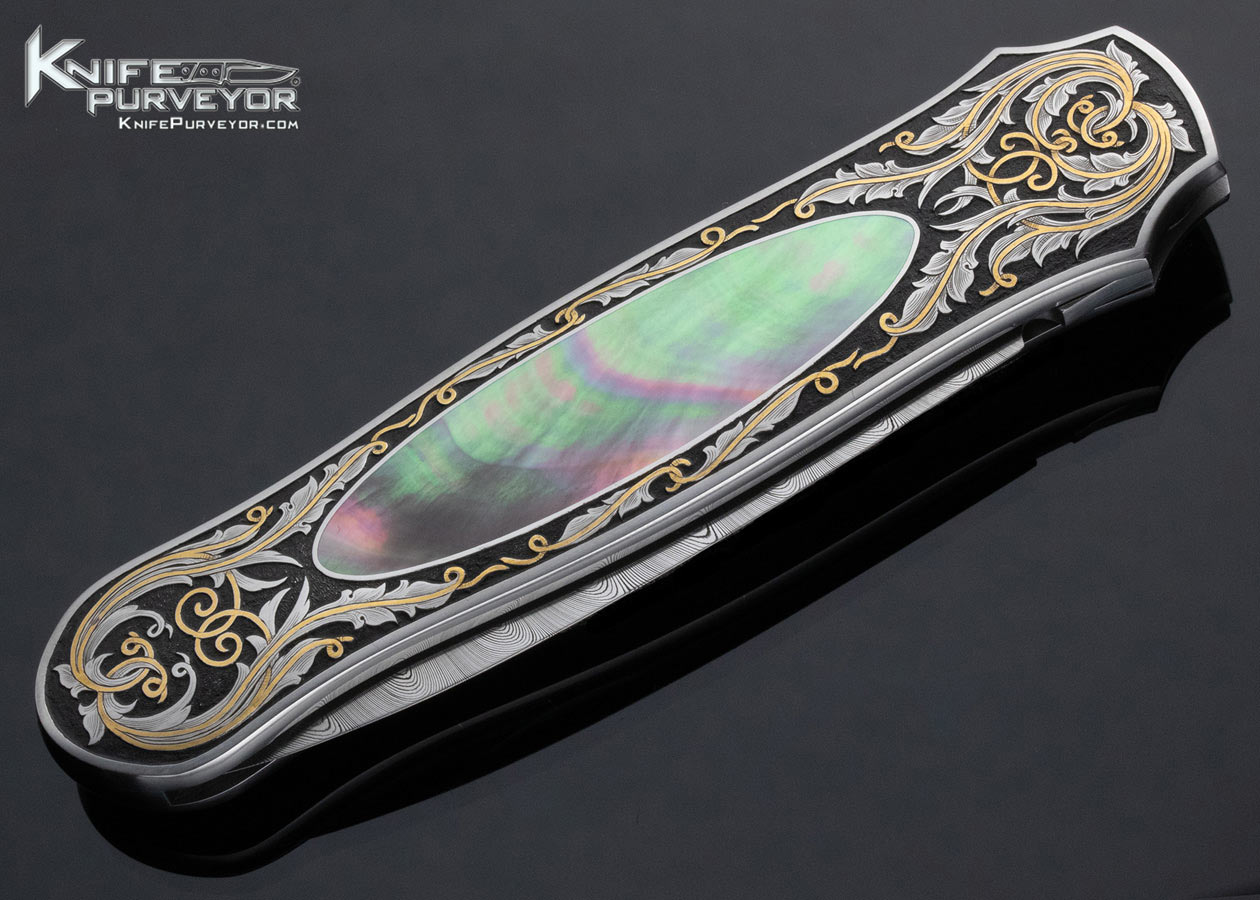 Tom Overeynder Custom Knife Damasteel and Black Lip Tahitian Pearl Shell Interframe Lockback Dagger Engraved By Joe Mason - Image 4