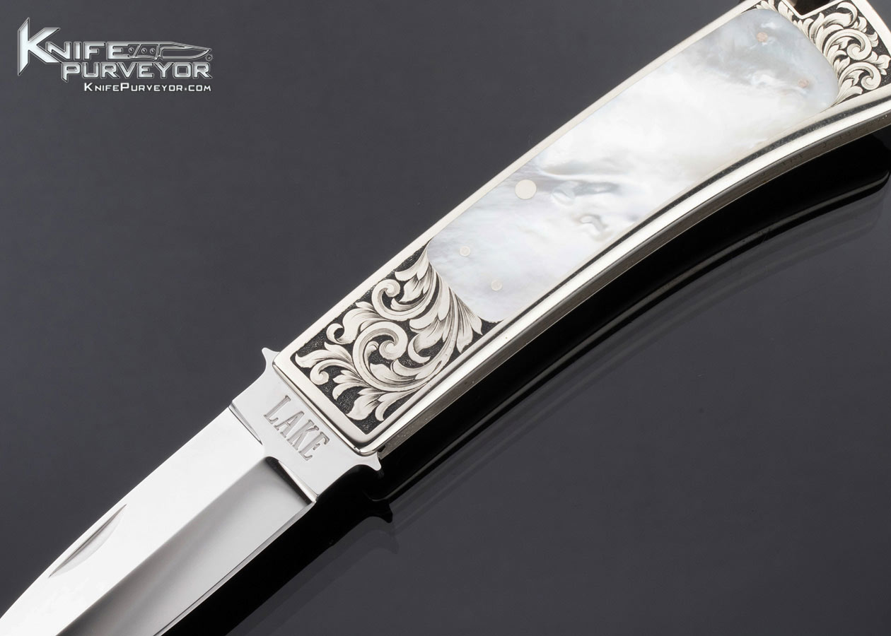 Ron Lake Custom Knife Mother of Pearl Interframe Boot Blade Tail Lock Engraved by Lynton McKenzie - Image 2
