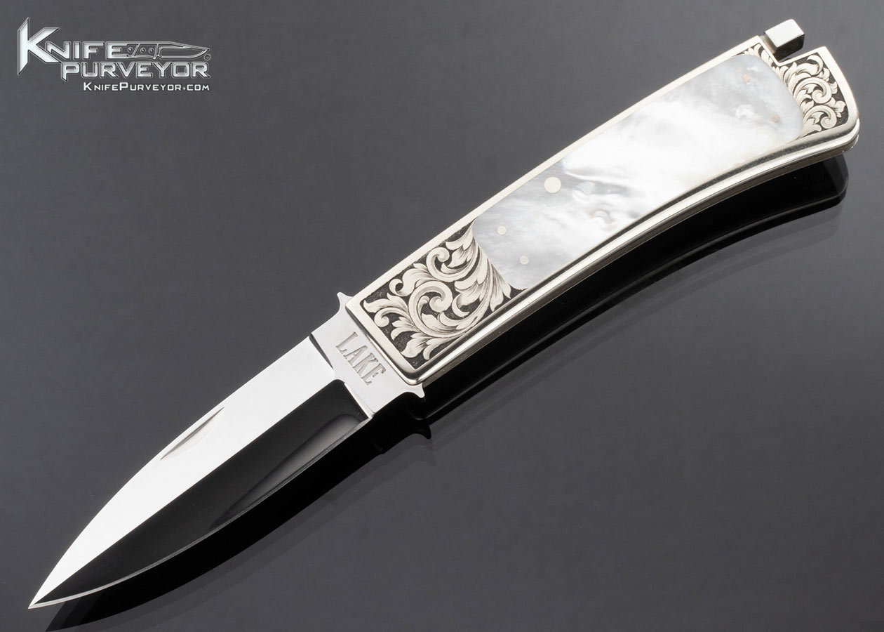Ron Lake Custom Knife Mother of Pearl Interframe Boot Blade Tail Lock Engraved by Lynton McKenzie 16511