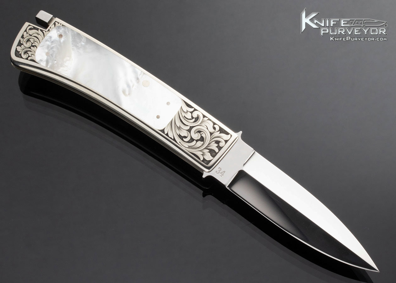 Ron Lake Custom Knife Mother of Pearl Interframe Boot Blade Tail Lock Engraved by Lynton McKenzie - Image 4