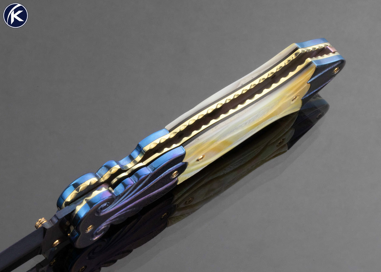 Suchat Jangtanong Custom Knife Blued Damascus Carved and Stippled Anodized Titanium with Carved South Sea Gold Lip Pearl - Image 6