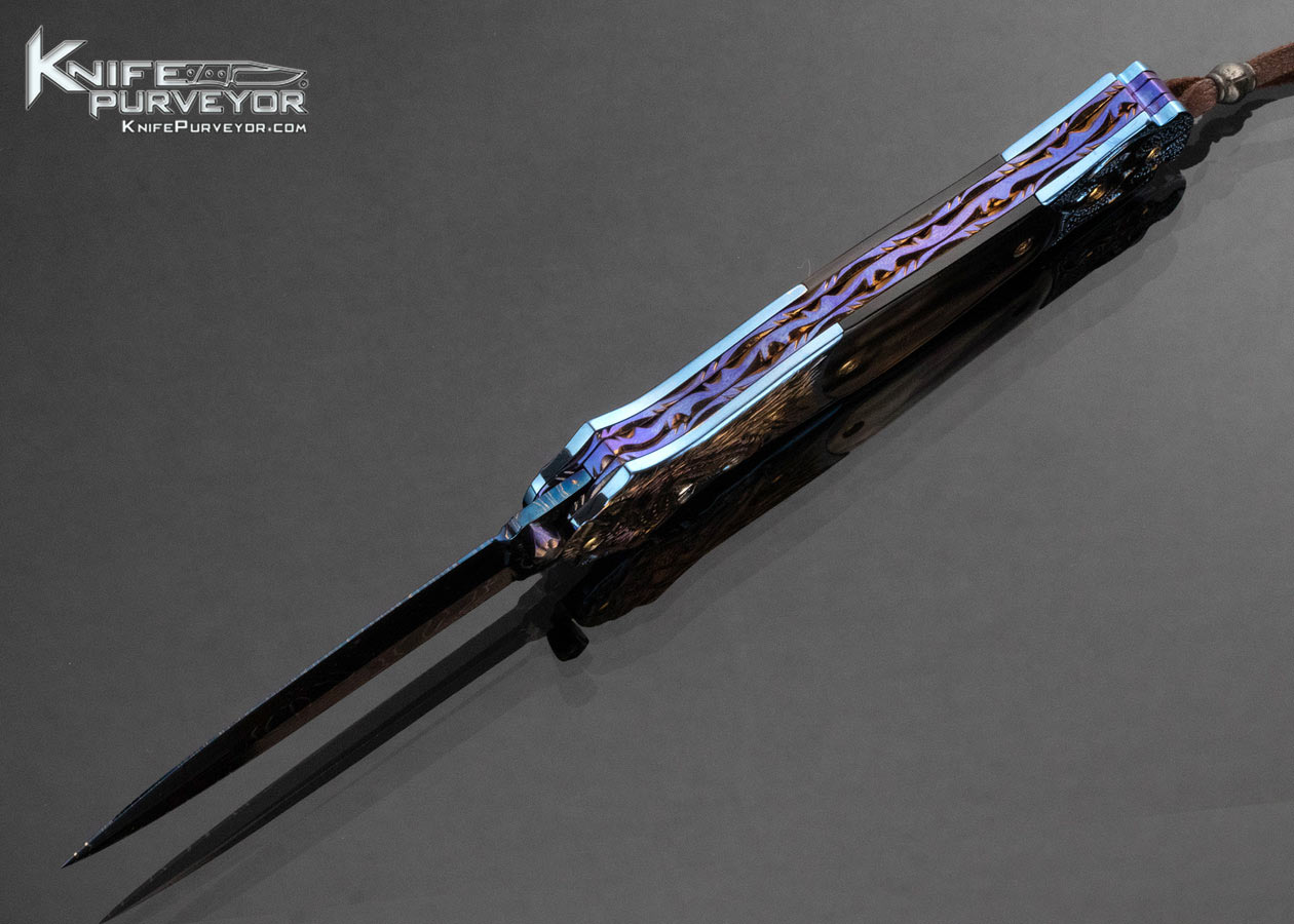Suchat Jangatong Custom Knife Blued Damscus with Black Lip Tahitian Pearl and Carved Anodized Titanium Linerlock - Image 5