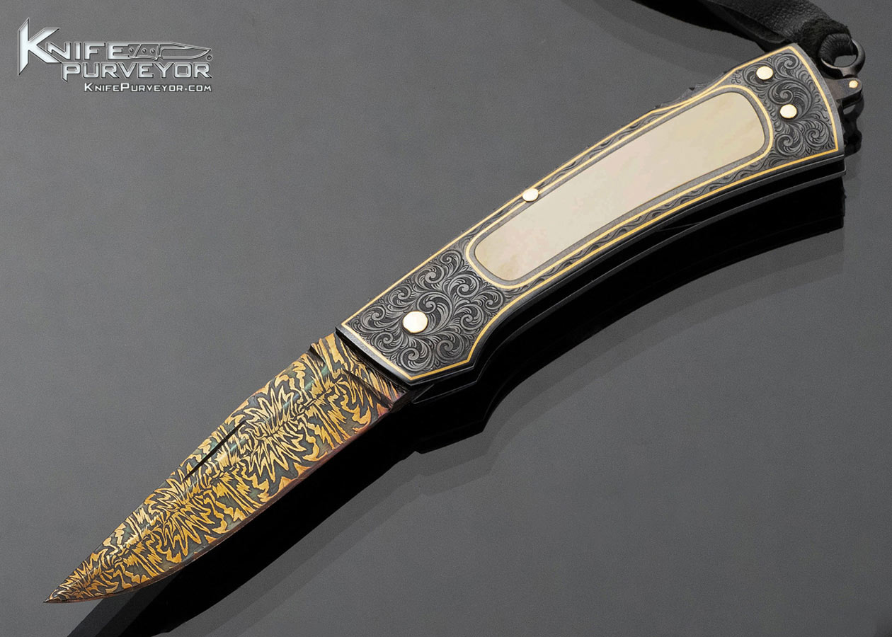 Kay-Embretsen-Custom-Knife-Blued-Sole-Authorship-Damascus-with-Gold-Lip-Pearl-Lockback-Engraved-by-Hans-Svenson-