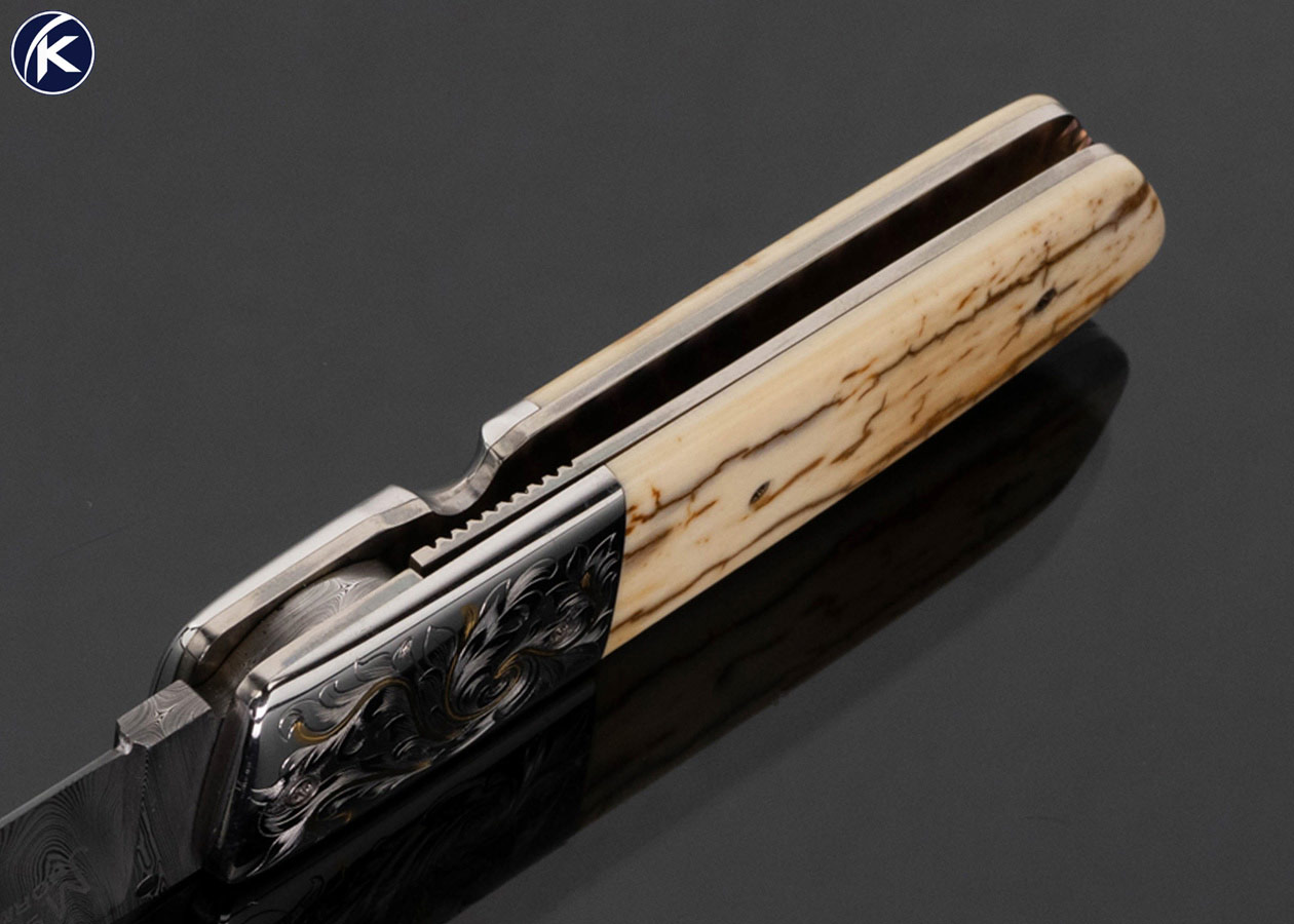 jerry-mcclure-custom-knife-engraved-with-gold-inlays-and-wooly-mammoth-linerlock-17790