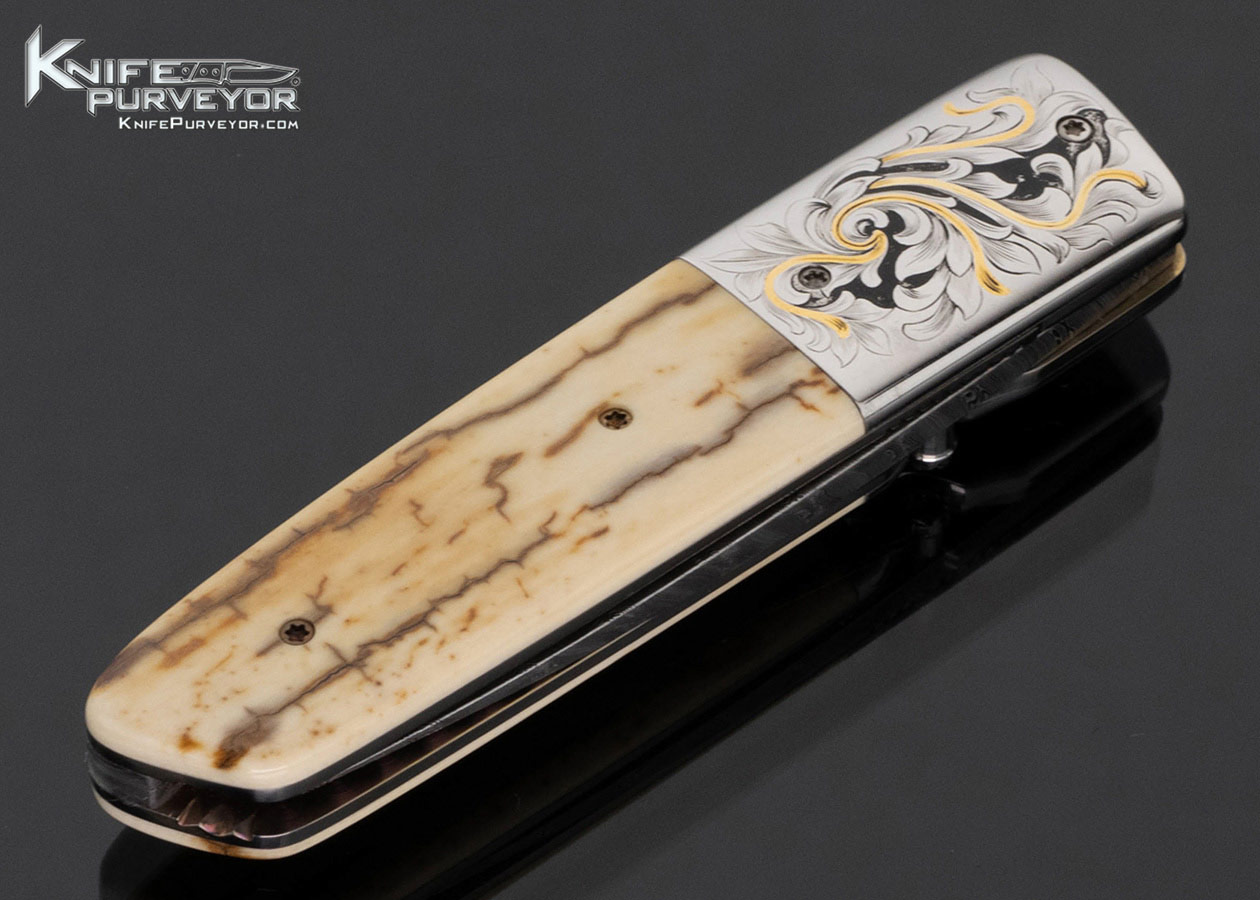 jerry-mcclure-custom-knife-engraved-with-gold-inlays-and-wooly-mammoth-linerlock-17790