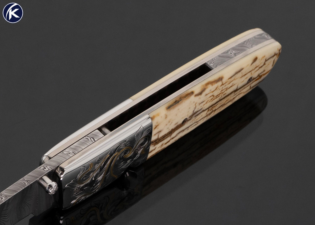 jerry-mcclure-custom-knife-engraved-with-gold-inlays-and-wooly-mammoth-linerlock-17790