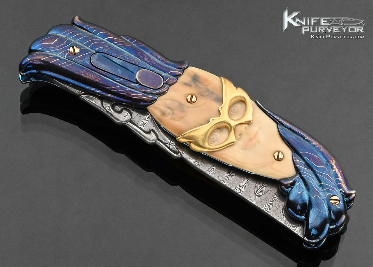 Stephen Olszewski Custom Knife "Mardi Gras" Blued Damascus with Carved Mammoth Automatic Linerlock