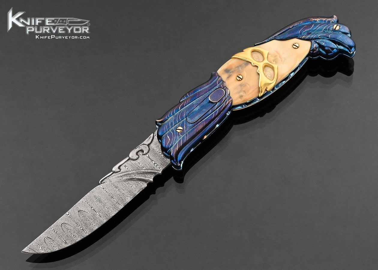 Stephen Olszewski Custom Knife "Mardi Gras" Blued Damascus with Carved Mammoth Automatic Linerlock