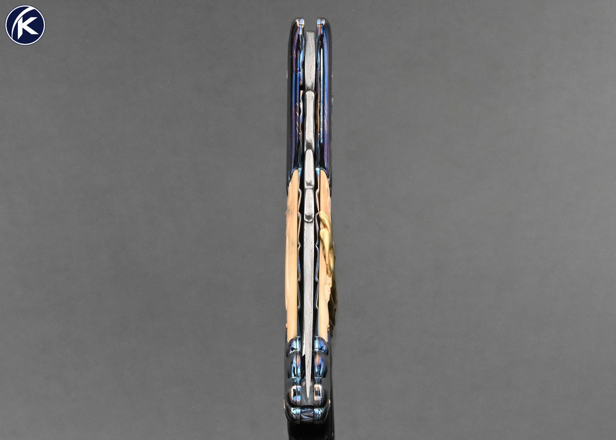 Stephen Olszewski Custom Knife "Mardi Gras" Blued Damascus with Carved Mammoth Automatic Linerlock