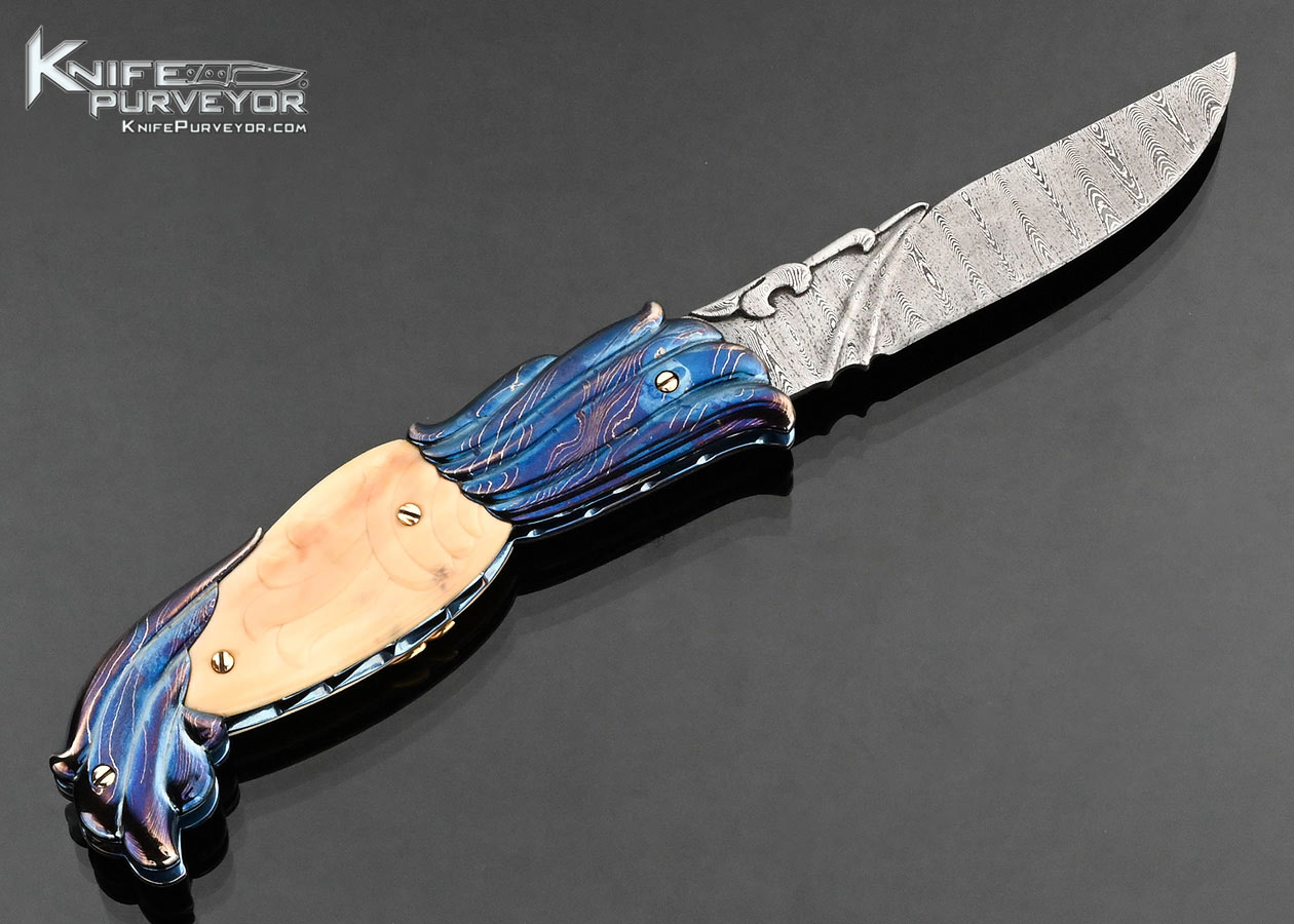 Stephen Olszewski Custom Knife "Mardi Gras" Blued Damascus with Carved Mammoth Automatic Linerlock