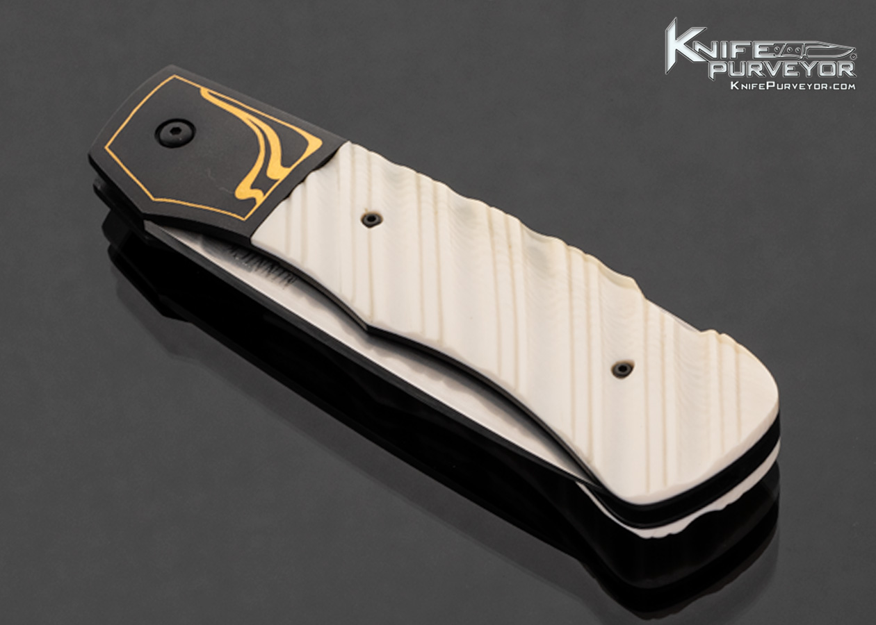 Jim Minnick Custom Knife Fluted Mammoth and Blued Stainless Steel with Gold Inlays Engraved by Joyce Minnick Lockback - Image 2