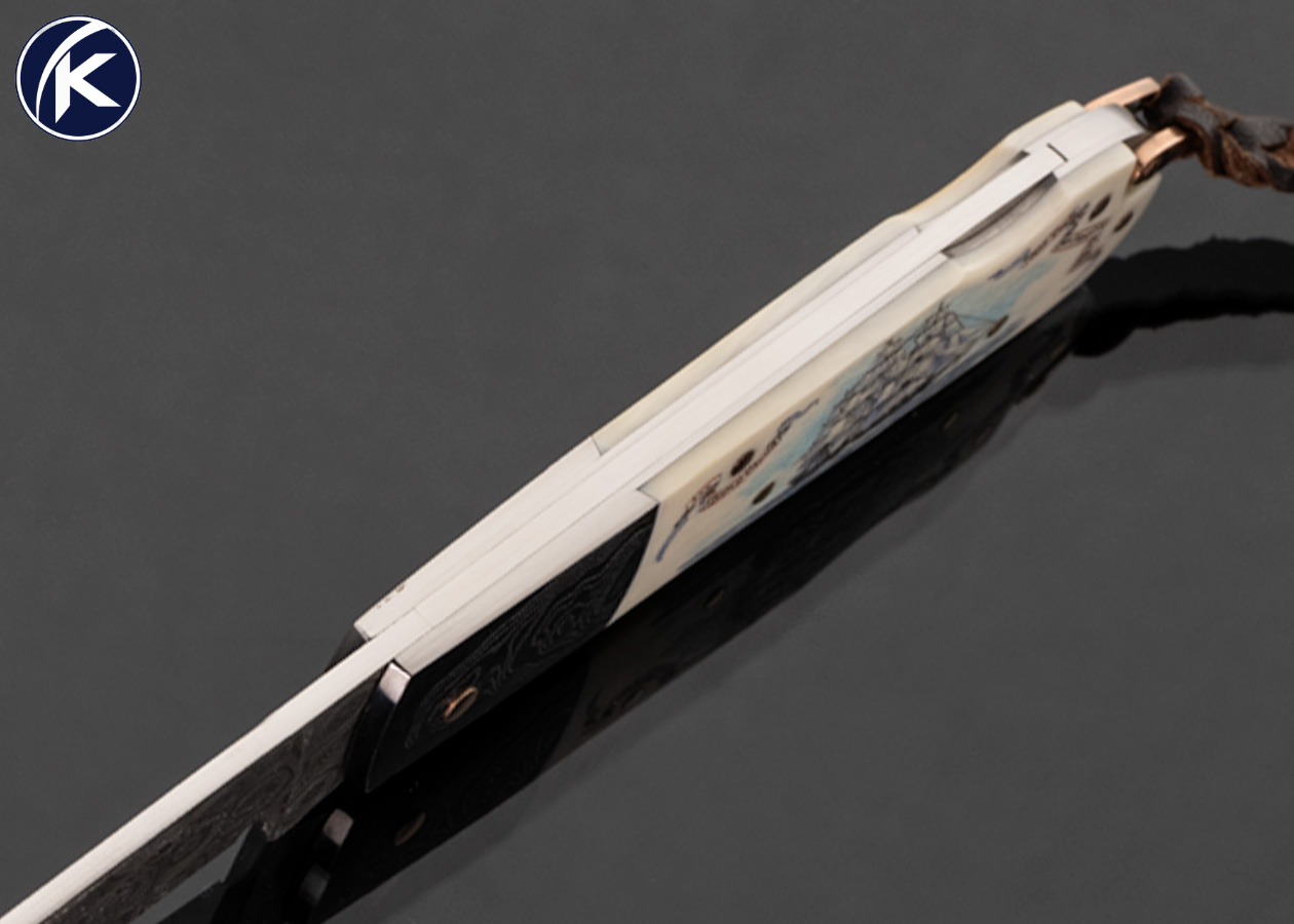 Warren Osborne Custom Knife Damascus and Mammoth Lockback Scrimshawed "Flying Cloud and Routes" by Matt Stothart with Rose Gold Pins and Bail - Image 5