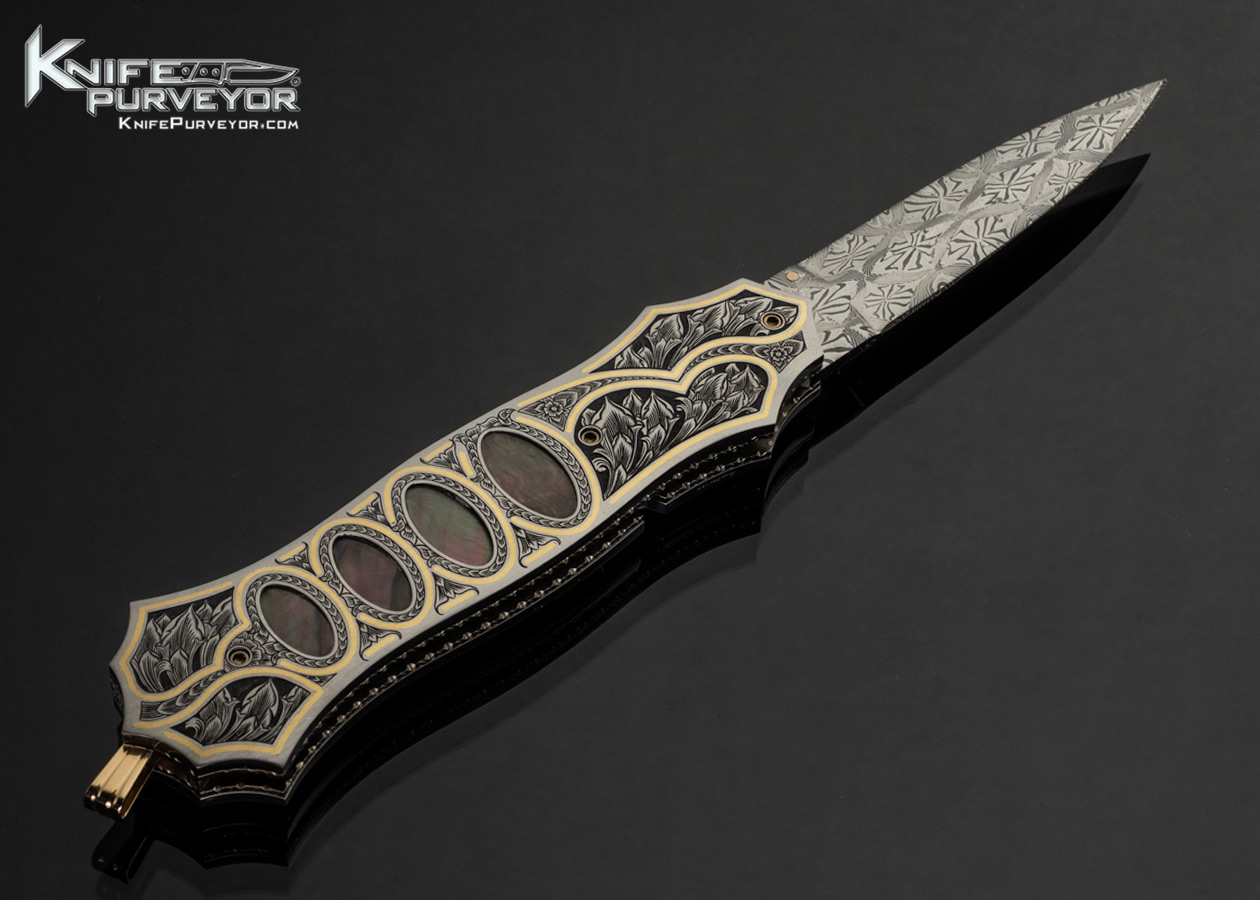 Jerry Corbit Custom Knife Robert Eggerling Damascus Black Lip Pearl Multi Interframe Linerlock Dagger Engraved by Bruce Shaw with Gold Inlays and Gold Bale - Image 3