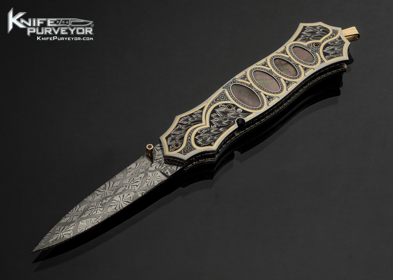 Jerry Corbit Custom Knife Robert Eggerling Damascus Black Lip Pearl Multi Interframe Linerlock Dagger Engraved by Bruce Shaw with Gold Inlays and Gold Bale