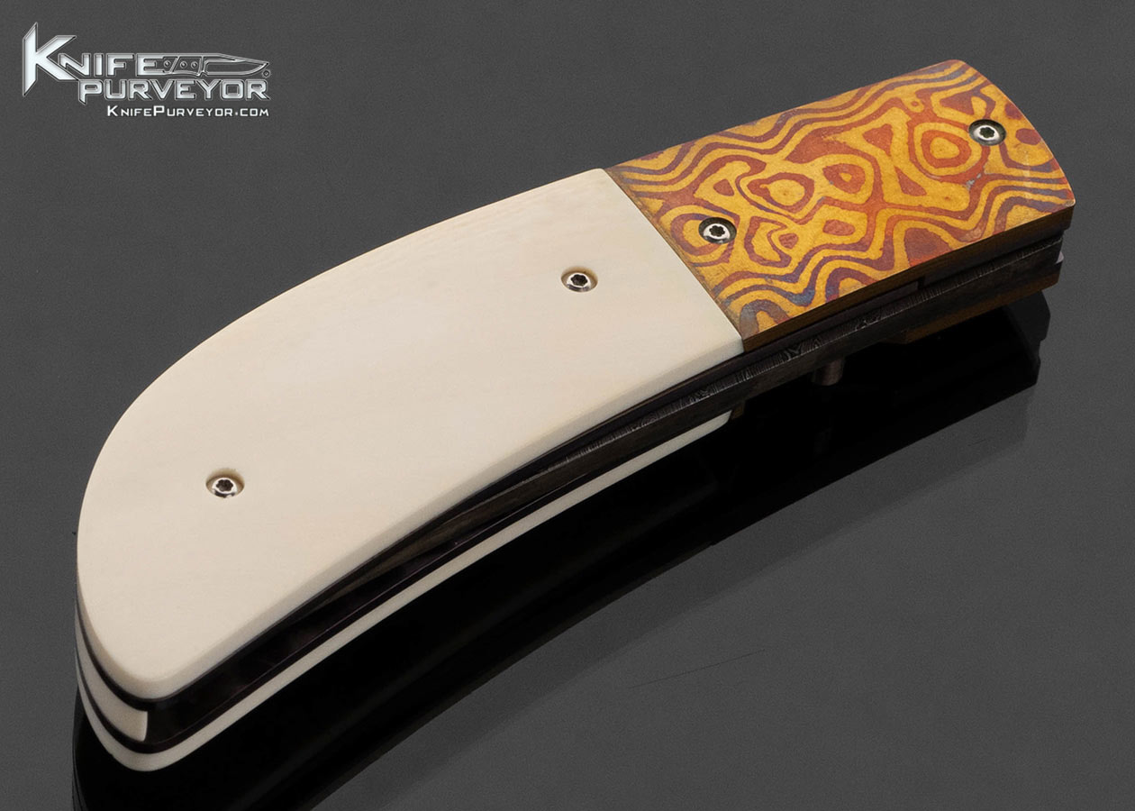 Melvin Gurganus Custom Knife Damascus and Mokume Bolsters with Mammoth Scrimshawed by Rick Bowles Linerlock
