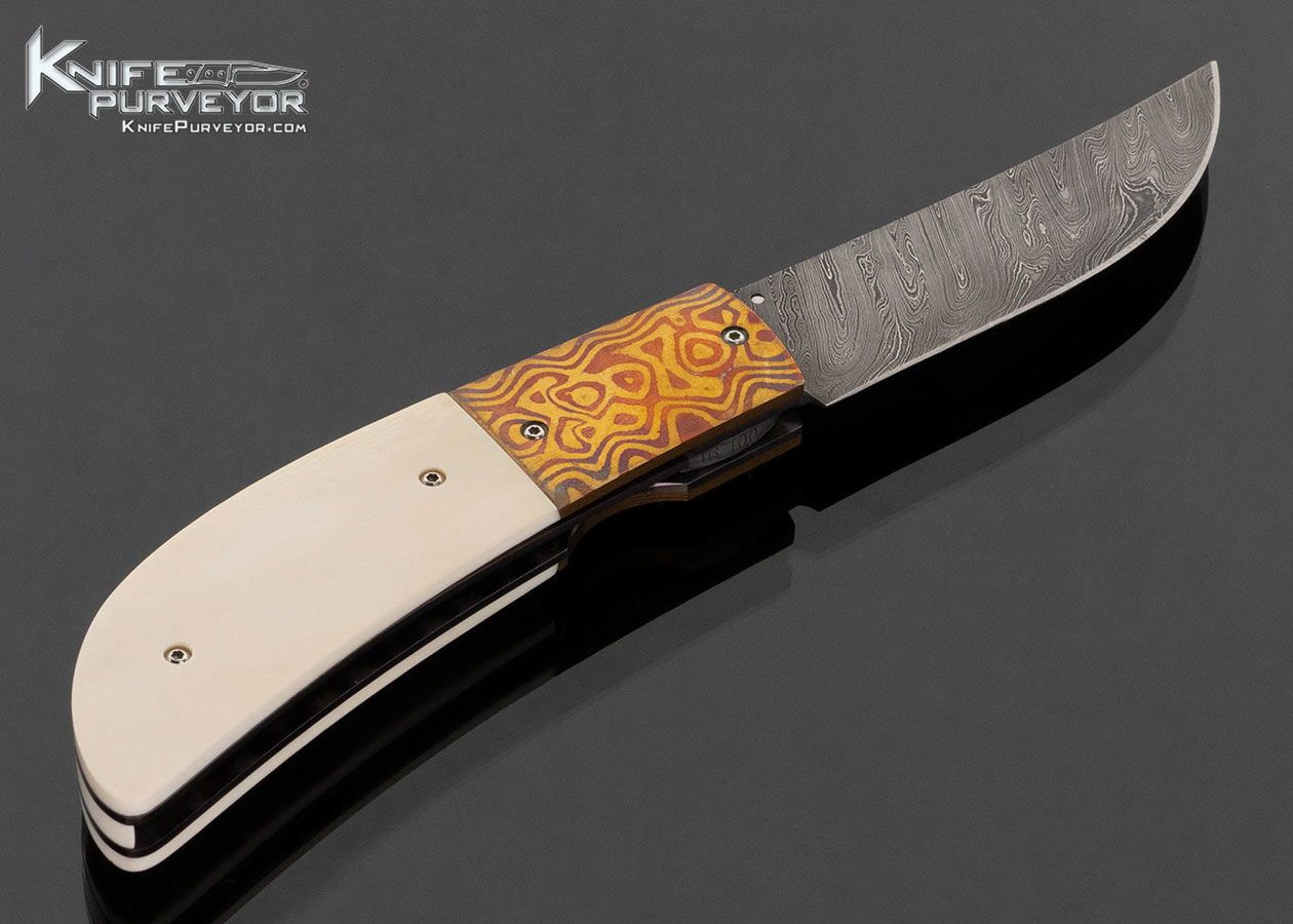 Melvin Gurganus Custom Knife Damascus and Mokume Bolsters with Mammoth Scrimshawed by Rick Bowles Linerlock