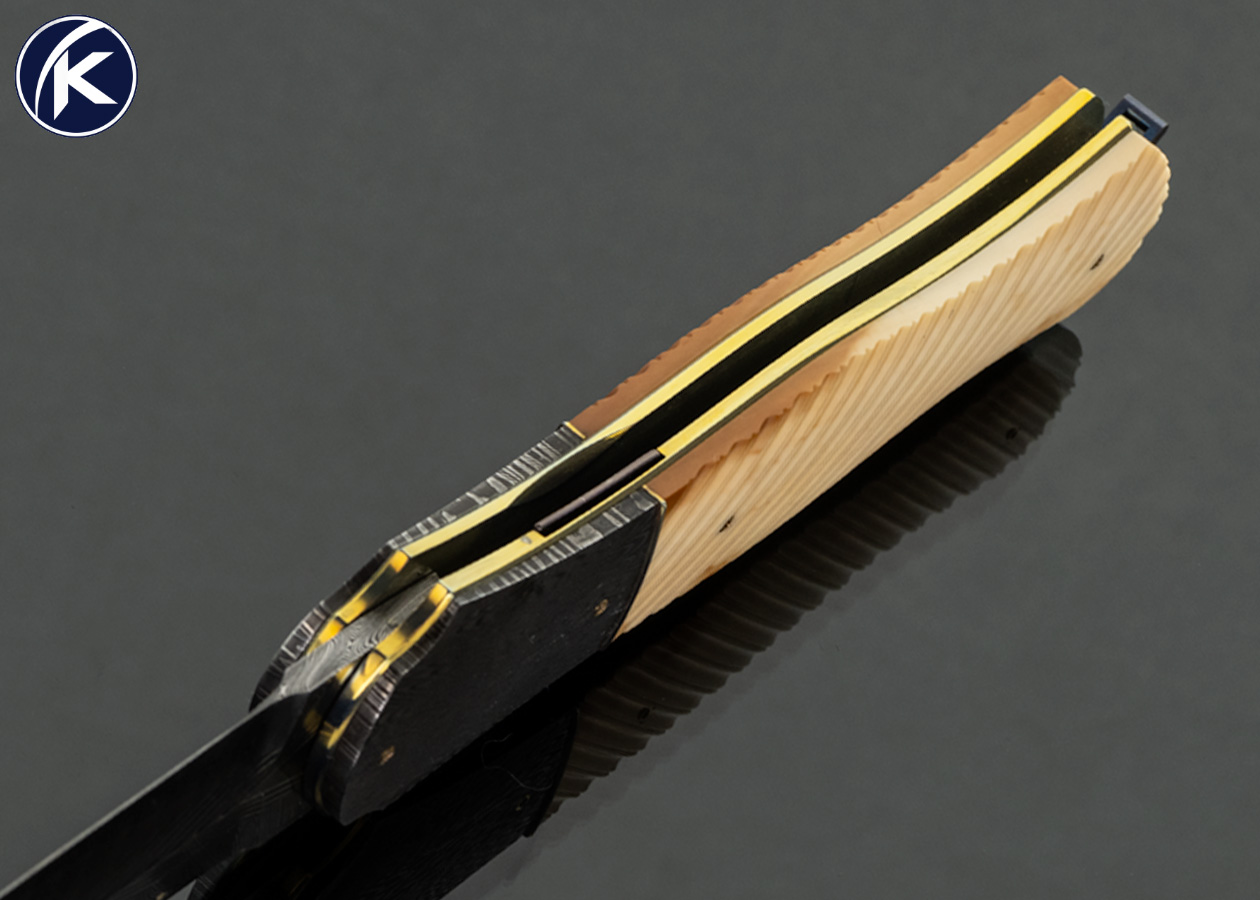 Owen Wood Custom Knife Sole Authorship Chevron and Twist Damascus with 24Kt Gold Inlays and Mosaic Damascus Bolsters with Fluted Fossil Walrus Linerlock Dagger - Image 5