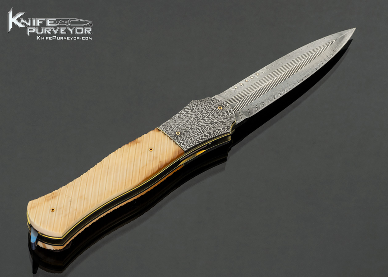 Owen Wood Custom Knife Sole Authorship Chevron and Twist Damascus with 24Kt Gold Inlays and Mosaic Damascus Bolsters with Fluted Fossil Walrus Linerlock Dagger - Image 3