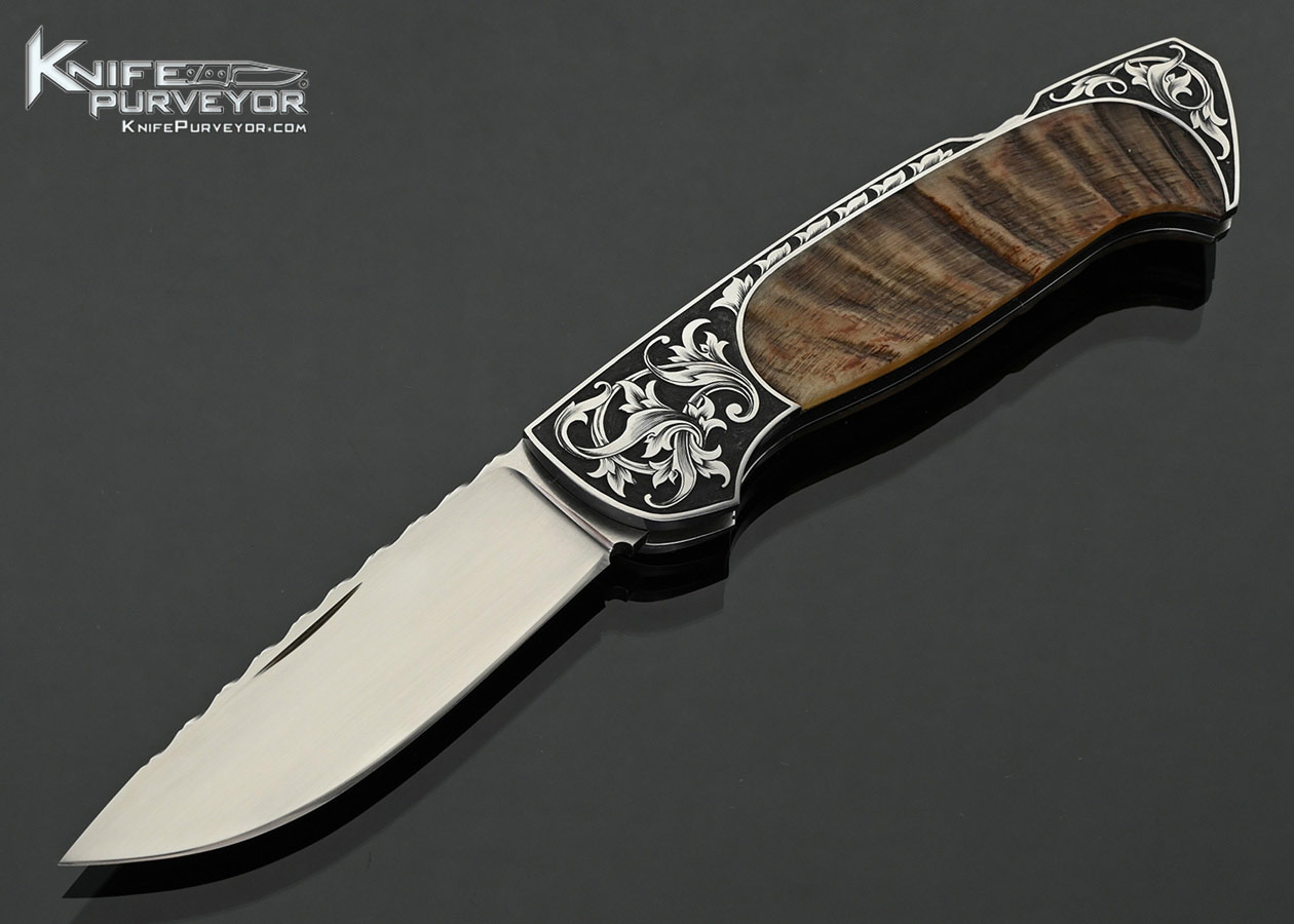 Joe Kious Custom Knife Big Horn Sheep Horn Semi Interframe Lockback Engraved by Christy George