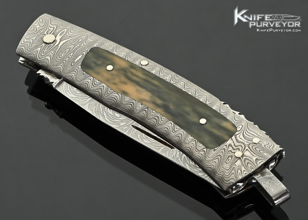 Kay-Embretsen-Custom-Knife-Sole-Authorship-Explosion-Damascus-and-Mammoth-Interframe-Lockback-