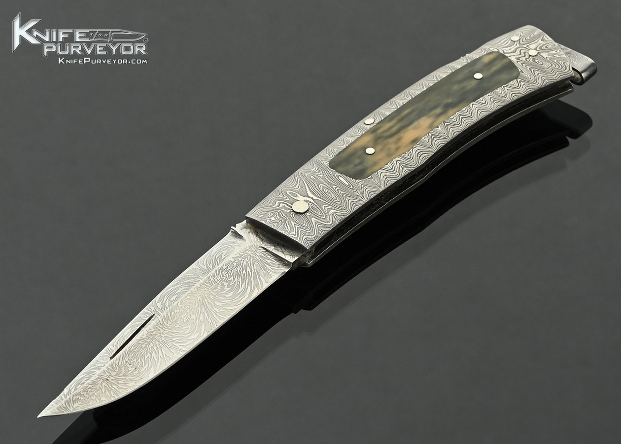 Kay-Embretsen-Custom-Knife-Sole-Authorship-Explosion-Damascus-and-Mammoth-Interframe-Lockback-