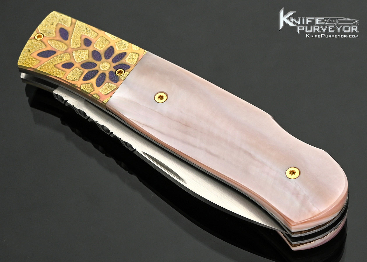 W.D.-Pease-Custom-Knife-Anodized-and-Stippled-Titanium-Bolsters-with-Pink-Pearl-Lockback-