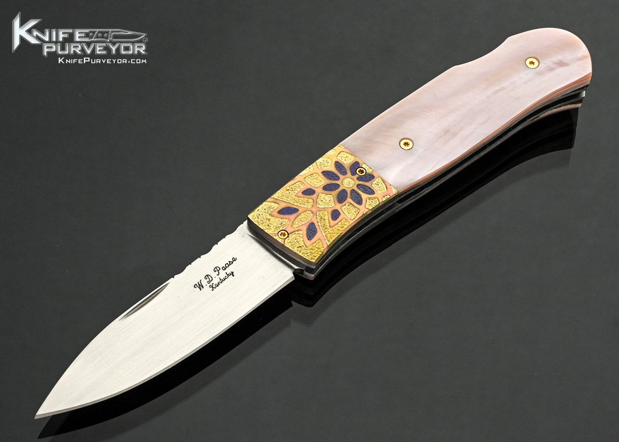 W.D.-Pease-Custom-Knife-Anodized-and-Stippled-Titanium-Bolsters-with-Pink-Pearl-Lockback-
