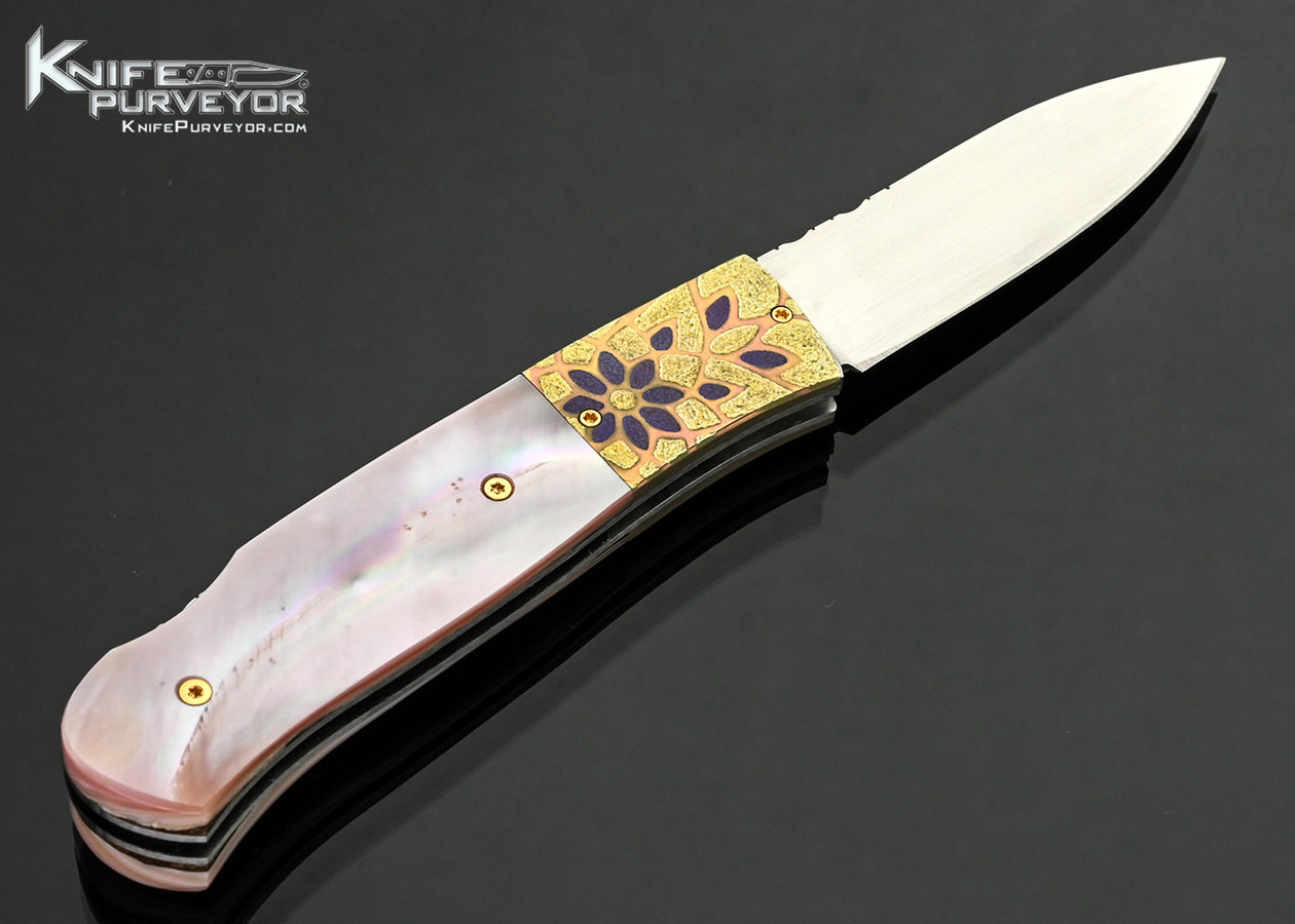 W.D.-Pease-Custom-Knife-Anodized-and-Stippled-Titanium-Bolsters-with-Pink-Pearl-Lockback-