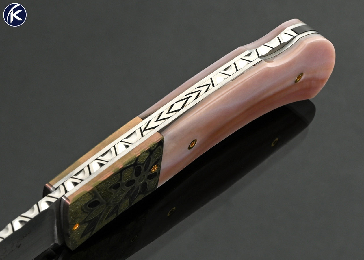 W.D.-Pease-Custom-Knife-Anodized-and-Stippled-Titanium-Bolsters-with-Pink-Pearl-Lockback-