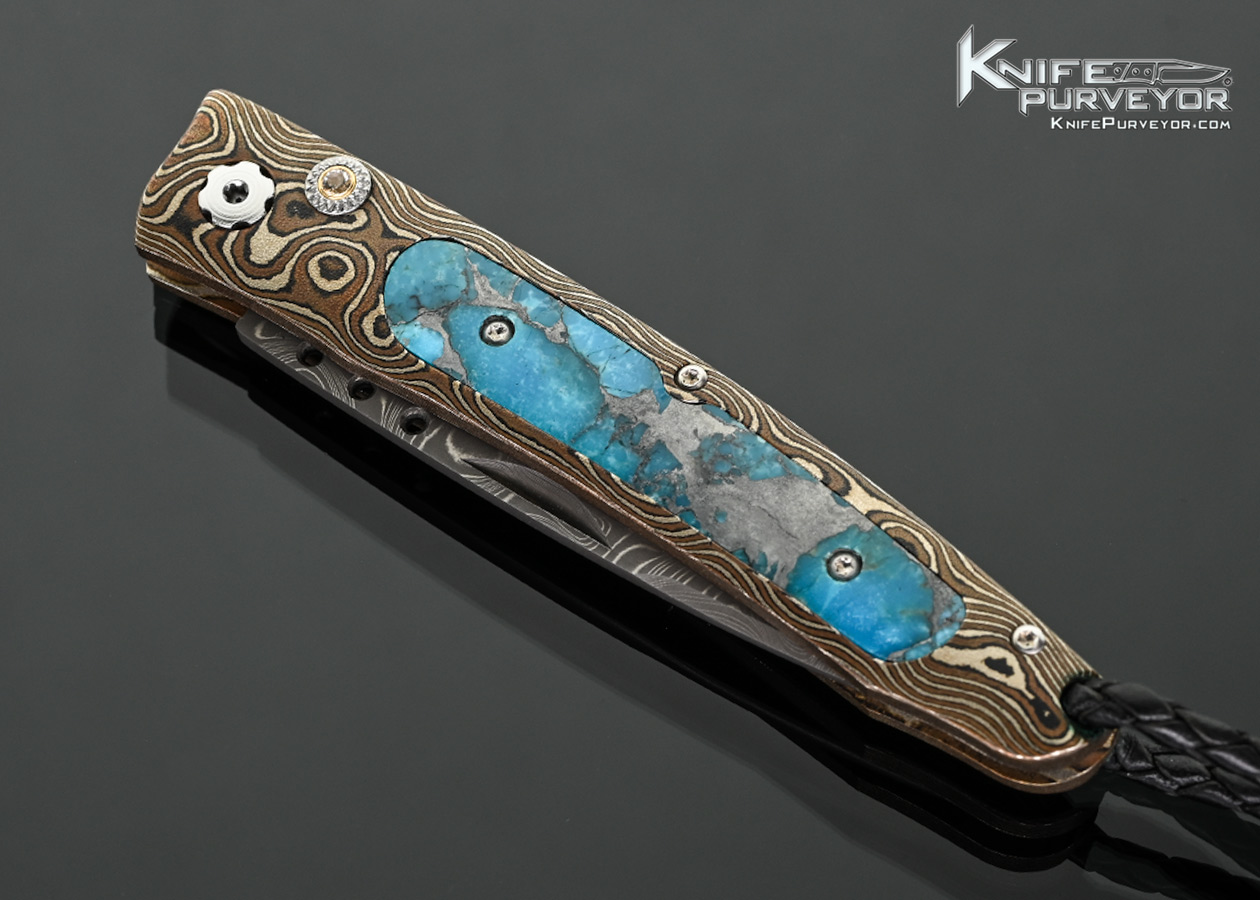 William Henry Custom Knife "Cave Creek" Damascus and Raindrop Mokume with Zinc Matrix Turquoise Interframe Button Lock - Image 2